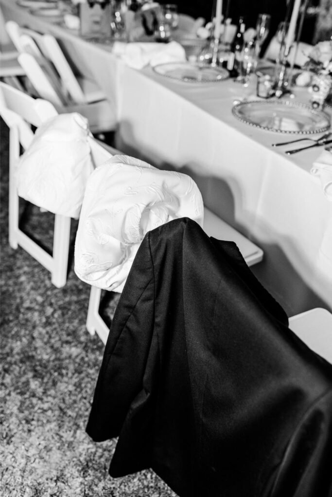 detachable puff sleeves left on a wedding reception chair