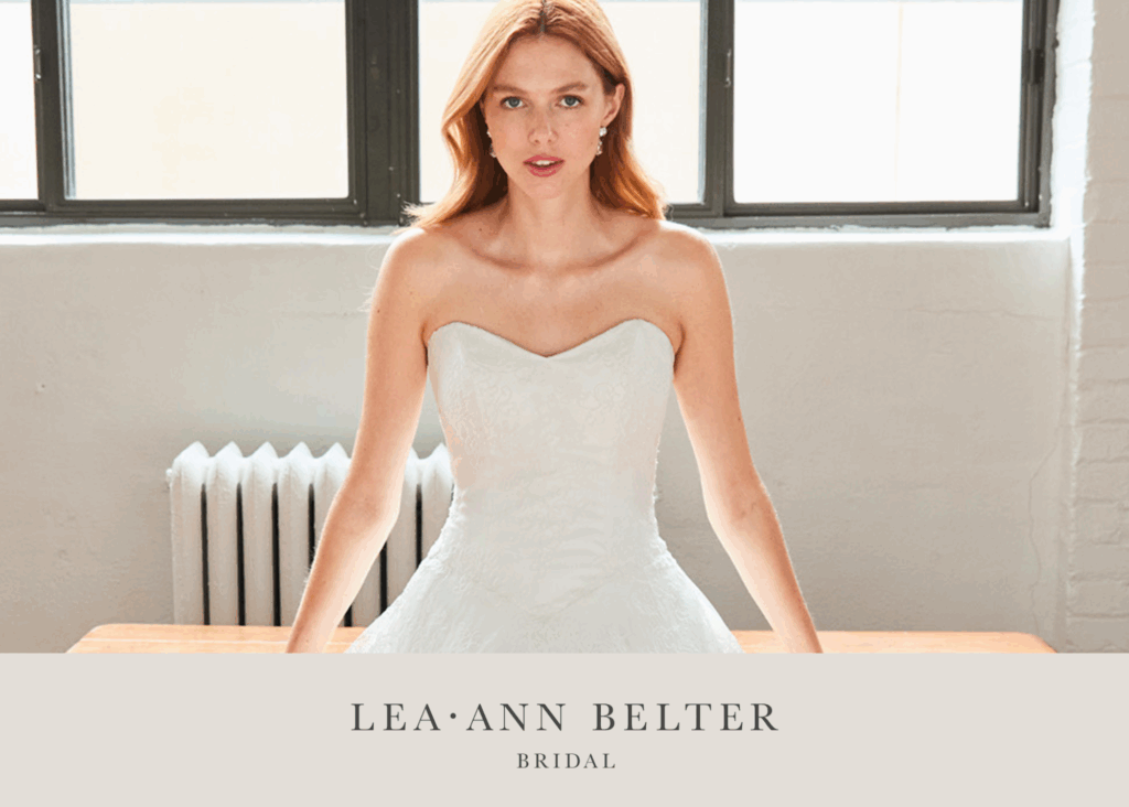 Modern lace Basque waist wedding dress with strapless sweetheart bodice by Lea-Ann Belter Bridal Toronto