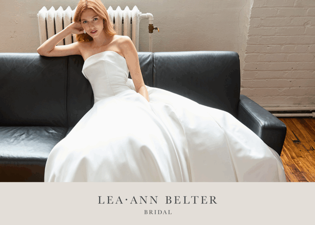 Classic Lea-Ann Belter ballgown wedding dress featuring strapless sweetheart neckline and voluminous silk skirt
