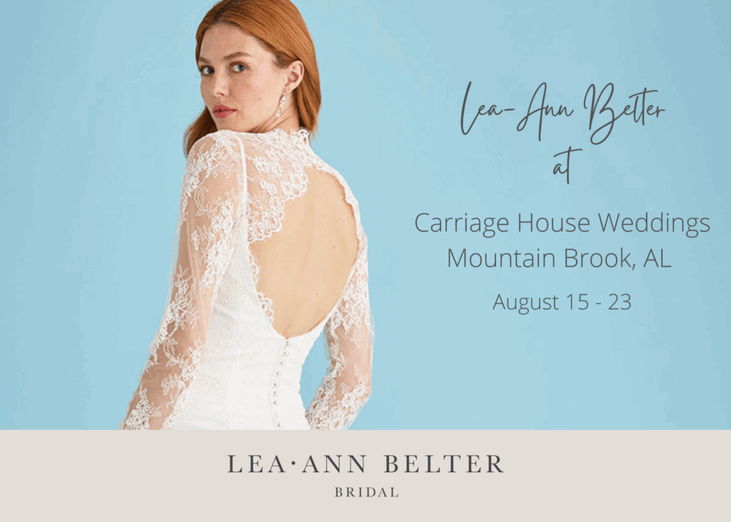 Model in a long sleeve lace wedding gown with open back, promoting the Lea-Ann Belter trunk show at Carriage House Weddings in Mountain Brook, Alabama