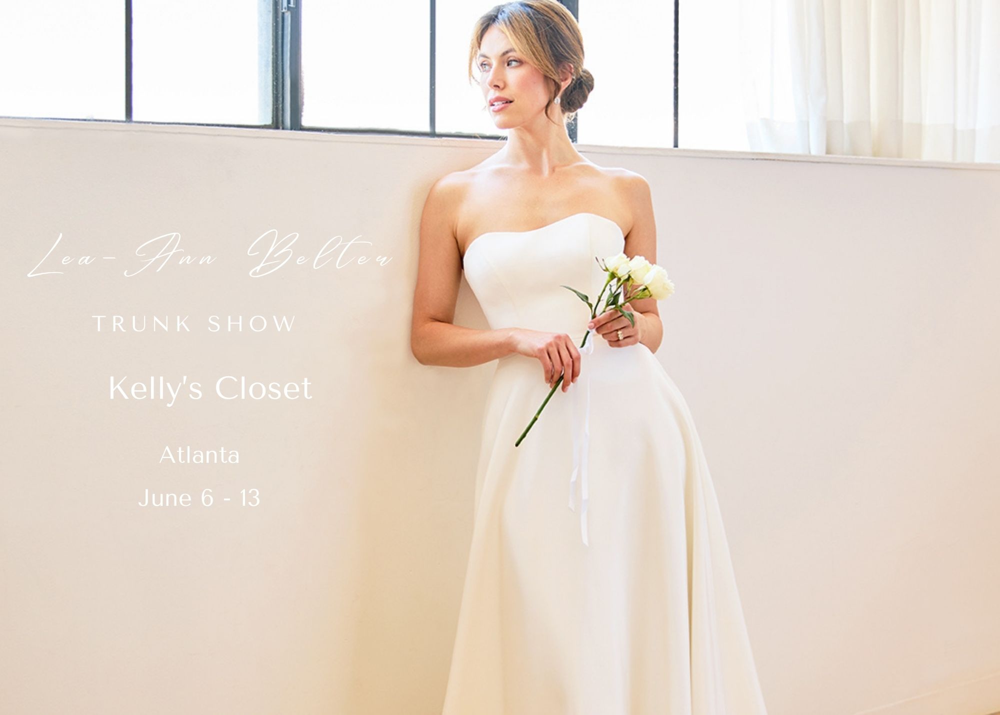 A bride in a sleek wedding dress leans against a wall, holding a bouquet. Text reads - Lea-Ann Belter Bridal Keepsake Collection Trunk show, Kelly's Closet, Atlanta, June 6 - 13